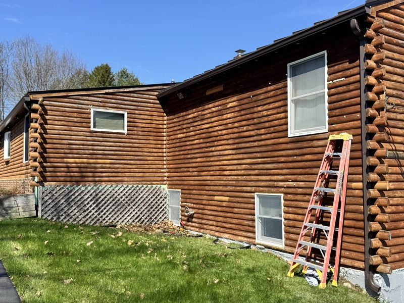 Log home with richly stained log walls
